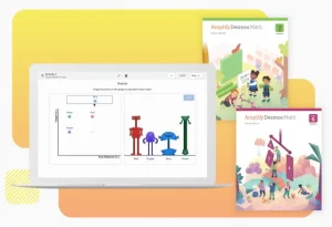 A laptop displaying a graph on a webpage labeled "Robots" sits next to two textbooks titled "Amplify Desmos Math," one being the teacher edition and the other for grade 6, exemplifying student-centered instruction through math technology.